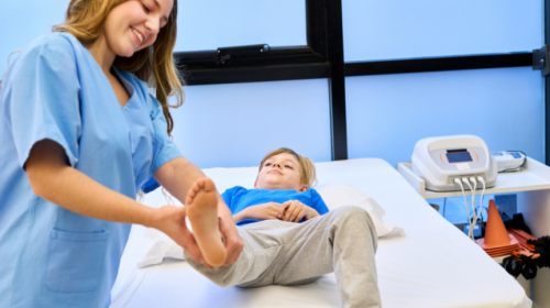 Orthopedic specialist assessing pediatric patient
