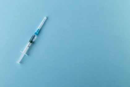 Regenerative Medicine | Stock Photo of Medical Needle on Blue Background