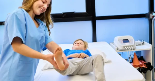 Orthopedic specialist assessing pediatric patient